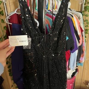 Beautiful black cocktail or homecoming dress. No flaws, brand new with tags.